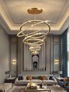 Тросова люстра Gold Crystal Longi з металевого каркасу в золотому кольорі з прозорим кришталем на 6 кілець