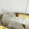 Підвісна видовжена люстра з скляними фактурними пластинами 80х30 см AS129L-800 AB+WT