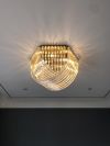 Стельова люстра Newport із закрученими скляними трубками у золотому каркасі